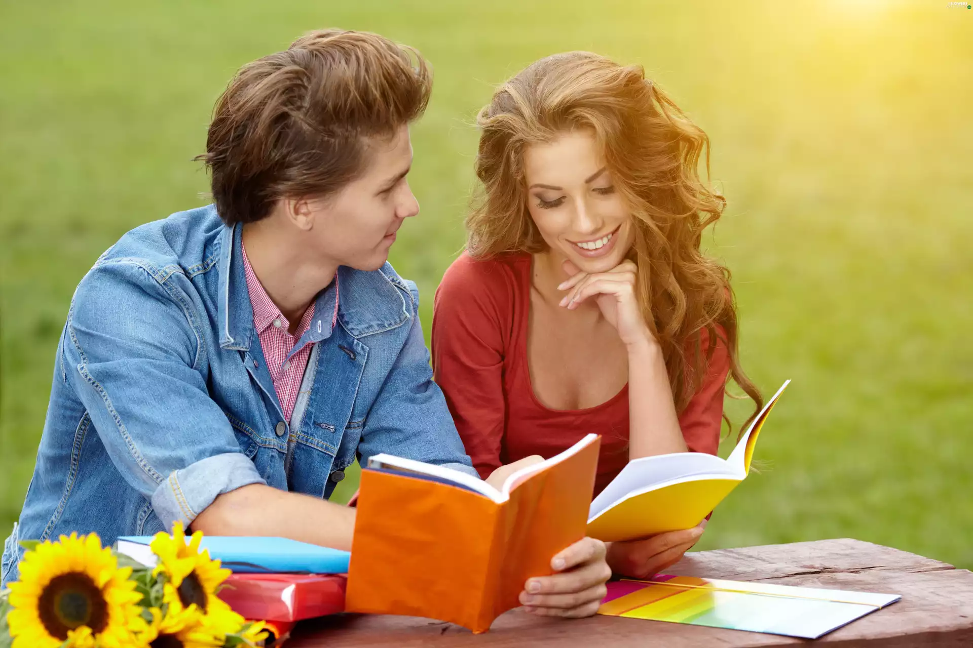 Women, Books, Nice sunflowers, a man